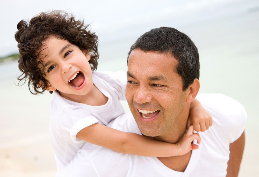 Father and Son Laughing Family Dentistry